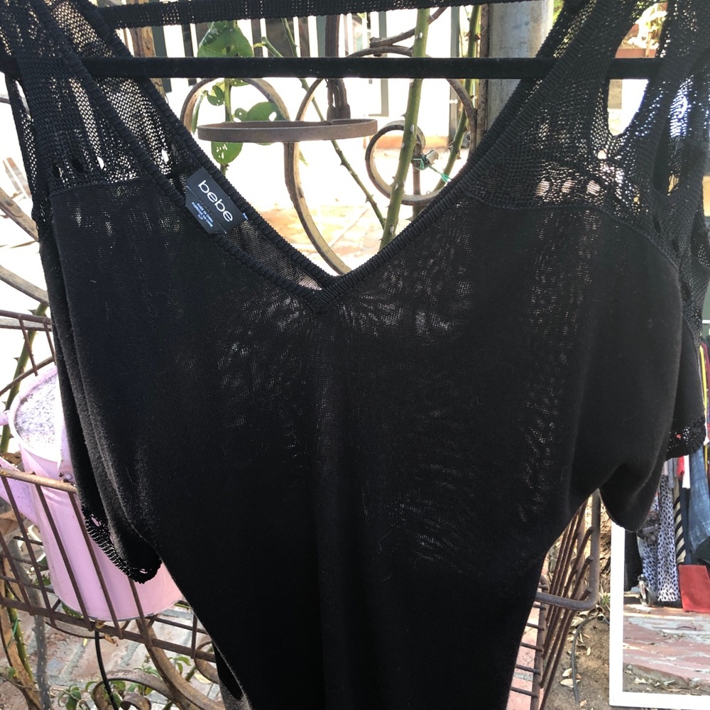 Bebe black V neck sweater with arms slits